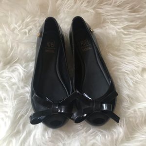 Mini Melissa’s black shoes